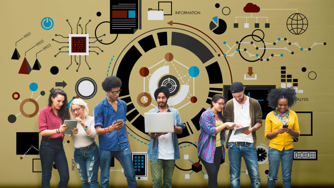 Jovens profissionais da Geração Z trabalhando simultaneamente em múltiplos computadores